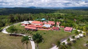 an aerial view of a house with red roofs at Hill Garden Resort Hotel in San Ignacio