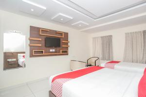 Postel nebo postele na pokoji v ubytování Super Hotel O Ivy Dew Drops