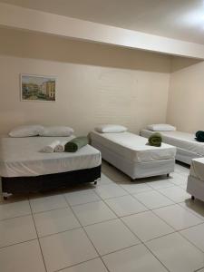 Postel nebo postele na pokoji v ubytování Pousada Rota do Parque