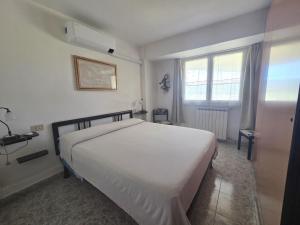 A bed or beds in a room at Villa Jone
