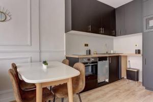 Kuchyň nebo kuchyňský kout v ubytování Le Royale Louis 14 + 4 fotografie