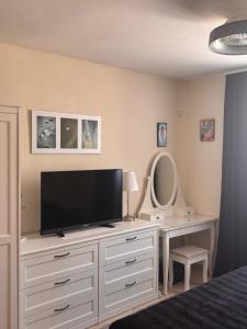 TV/Unterhaltungsangebot in der Unterkunft Apartmani Merica