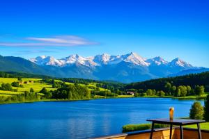 a view of a lake with mountains in the background at SMS-Homes I Auszeit am See #1 in Waltenhofen +3 photos
