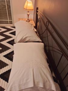 Ένα ή περισσότερα κρεβάτια σε δωμάτιο στο Stefkas apartment1