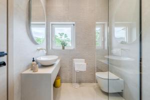 Ένα μπάνιο στο Beach Residence Parat +43 φωτογραφίες