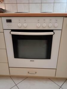 Kuchyň nebo kuchyňský kout v ubytování Stefkas apartment2