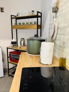 Η κουζίνα ή μικρή κουζίνα στο Shamà rooms +5 φωτογραφίες