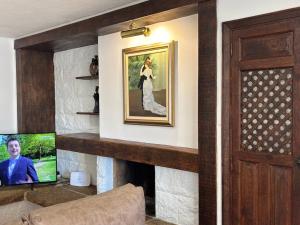 TV a/nebo společenská místnost v ubytování Garden - City Center - La Nogalera