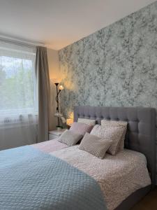 Ένα ή περισσότερα κρεβάτια σε δωμάτιο στο Luxury Residence Res - with parking