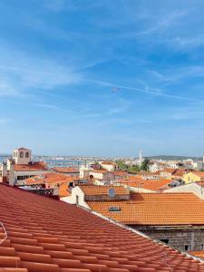 Nespecifikovaný výhled na destinaci Alghero nebo výhled na město při pohledu z apartmánu