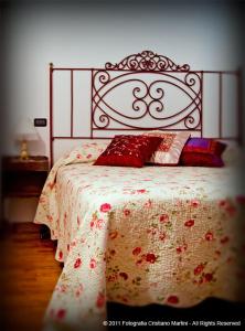 מיטה או מיטות בחדר ב-Campomaggio
