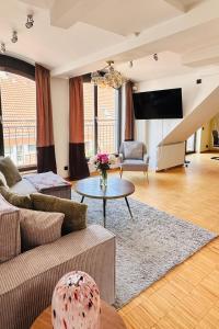 Posezení v ubytování Das Stader Penthouse mit Dachterrassen