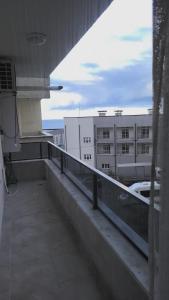 a balcony with a view of a building at Mukka Apart Hotel - شقق موكا الفندقية in Trabzon