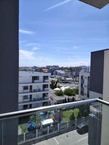 Balkón nebo terasa v ubytování Garsoniera Olivia - Amarilia Apartments