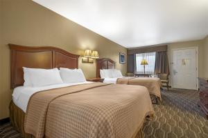 Voodi või voodid majutusasutuse Best Western Inn of Chandler toas
