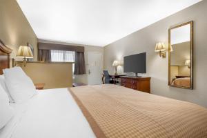 Voodi või voodid majutusasutuse Best Western Inn of Chandler toas