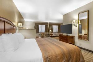 Voodi või voodid majutusasutuse Best Western Inn of Chandler toas