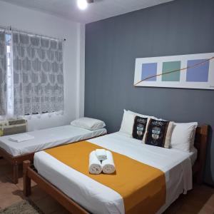 Cama ou camas em um quarto em Pousada 3 Corações Penedo