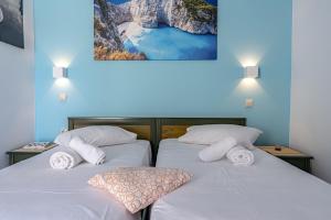 Letto o letti in una camera di Future Appts