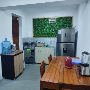 Køkken eller tekøkken på Hospedaje Hamuy's Lodge + 22 billeder