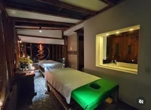 Postel nebo postele na pokoji v ubytování ASGARD Spa