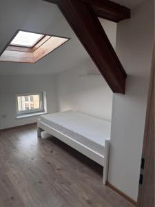Posteľ alebo postele v izbe v ubytovaní Apartament Gdańsk Wrzeszcz