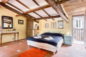 Letto o letti in una camera di Rome as you feel - Vacche Apartment with Terrrace