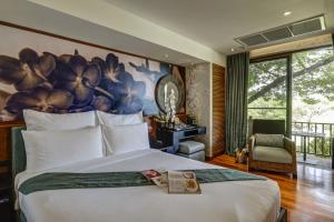 Cama o camas de una habitación en Baan Souchada Resort & Spa