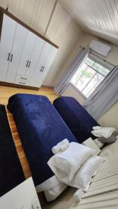 Postel nebo postele na pokoji v ubytování Casa aconchegante - compartilhada