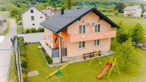 Herní místnost nebo prostor pro děti v ubytování Apartments and rooms with parking space Vranovaca, Plitvice - 17461