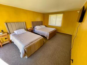 Postel nebo postele na pokoji v ubytování Casa Comigual