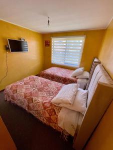 Postel nebo postele na pokoji v ubytování Casa Comigual