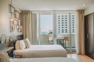 Katil atau katil-katil dalam bilik di Iberostar Waves Berkeley Shore