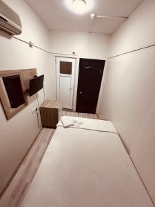 Postel nebo postele na pokoji v ubytování Sera Hotel