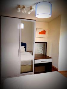 A bed or beds in a room at Mimoza İstiklal Apart Hotel