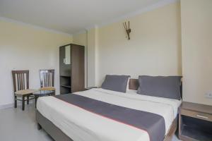 Postel nebo postele na pokoji v ubytování Townhouse Green Park Residency 1
