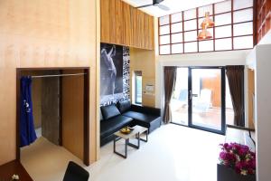 Posezení v ubytování Pavilion Pool Residence Samui - SHA Extra Plus