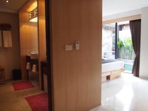 Postel nebo postele na pokoji v ubytování Pavilion Pool Residence Samui - SHA Extra Plus