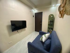TV a/nebo společenská místnost v ubytování Mamsis Cozy Home by RH