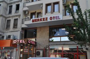 a building with a sign for a morzetter office at Merkez Otel in Izmir