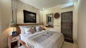 Postel nebo postele na pokoji v ubytování Bale Bali Inn + 37 fotografií