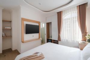 Voodi või voodid majutusasutuse Nature Hotel Da Lat - Le Dai Hanh toas