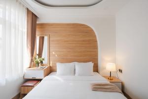 Voodi või voodid majutusasutuse Nature Hotel Da Lat - Le Dai Hanh toas