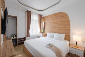 Voodi või voodid majutusasutuse Nature Hotel Da Lat - Le Dai Hanh toas