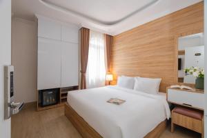 Voodi või voodid majutusasutuse Nature Hotel Da Lat - Le Dai Hanh toas