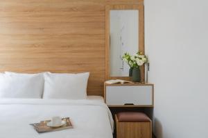 Voodi või voodid majutusasutuse Nature Hotel Da Lat - Le Dai Hanh toas