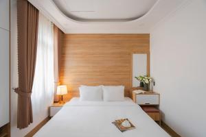Voodi või voodid majutusasutuse Nature Hotel Da Lat - Le Dai Hanh toas
