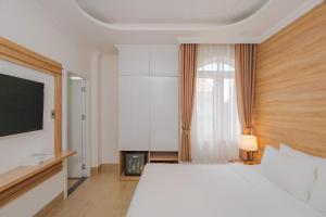Voodi või voodid majutusasutuse Nature Hotel Da Lat - Le Dai Hanh toas