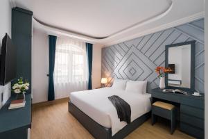 Voodi või voodid majutusasutuse Nature Hotel Da Lat - Le Dai Hanh toas