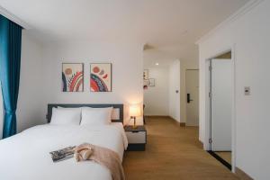 Voodi või voodid majutusasutuse Nature Hotel Da Lat - Le Dai Hanh toas